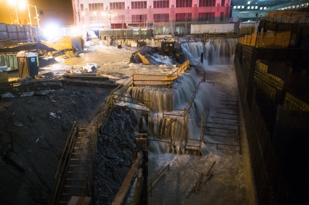Water floods the ground zero construction site during 2012 superstorm Sandy