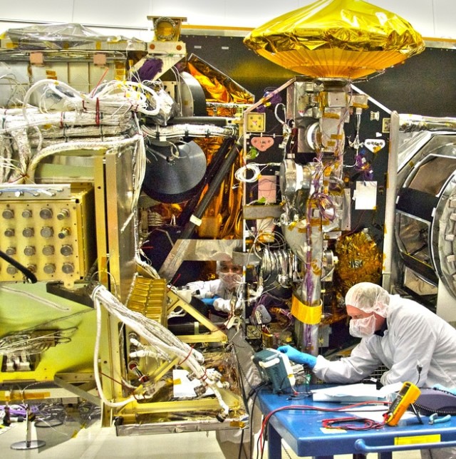NASA engineers work on the Global Precipitation Measurement mission’s Core satellite in the clean room at the Goddard Space Flight Center in Greenbelt, Maryland. 